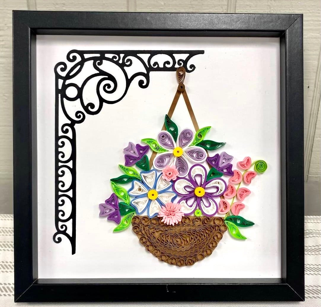 Quilled flower basket in black wood frame