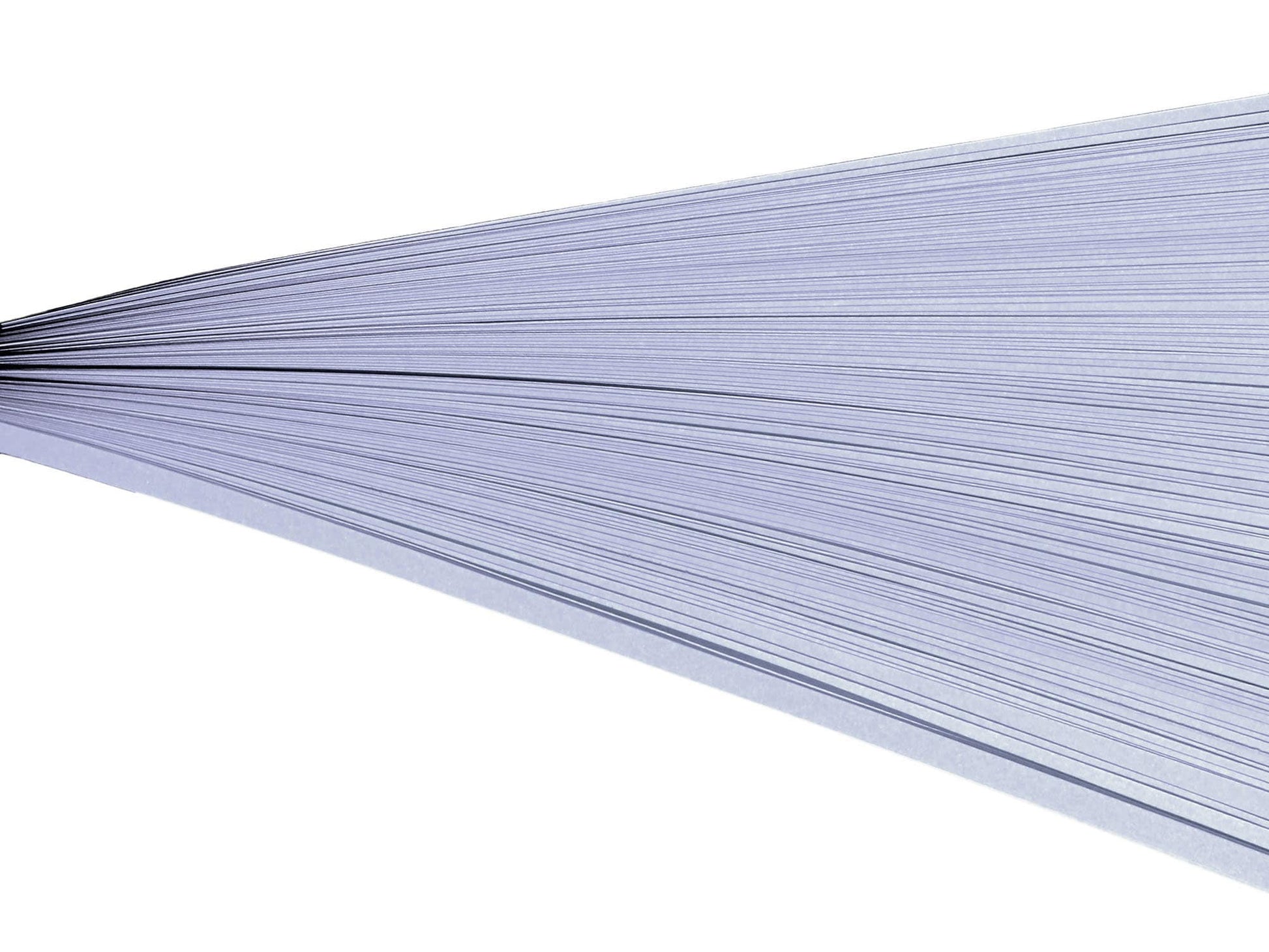 Lavender paper quilling strips on their side against a white background.