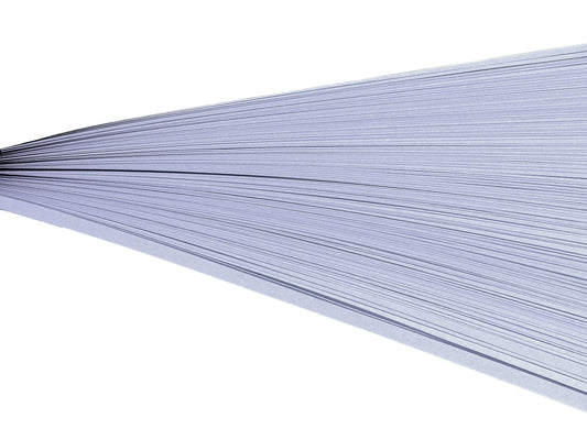 Lavender paper quilling strips on their side against a white background.