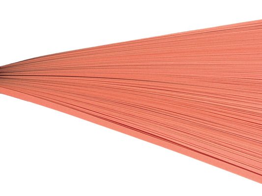 Salmon colored paper quilling strips.